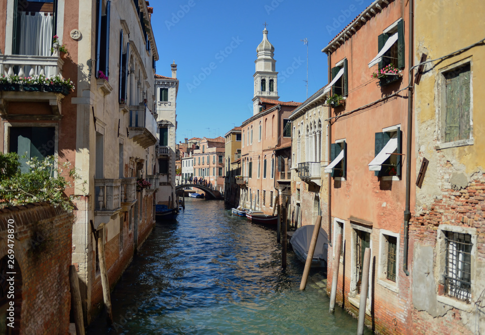 Docked boats on a canal in Venice Docked boats on a canal in Venice