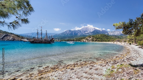 View of Tahtali Mountain and a bay with a boats, Phaselis, Kemer, Antalya