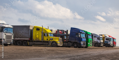 trucks in the Parking lot near the highway