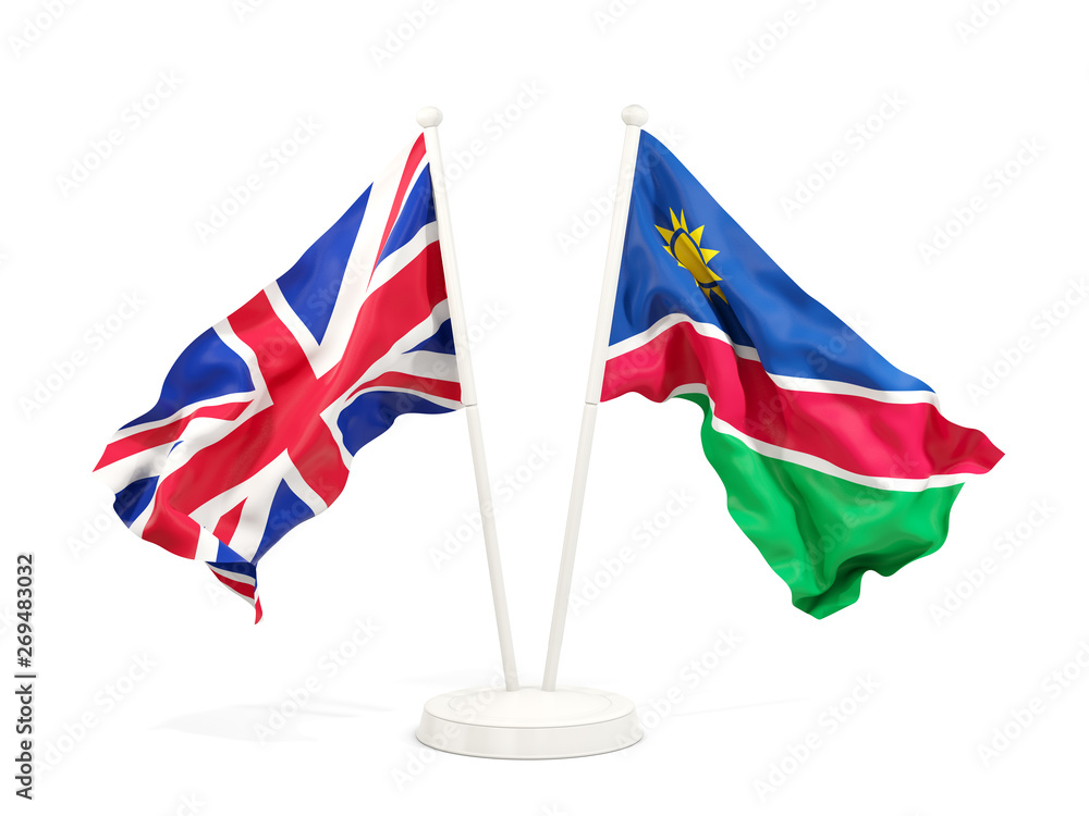 Fototapeta premium Two waving flags of UK and namibia isolated on white
