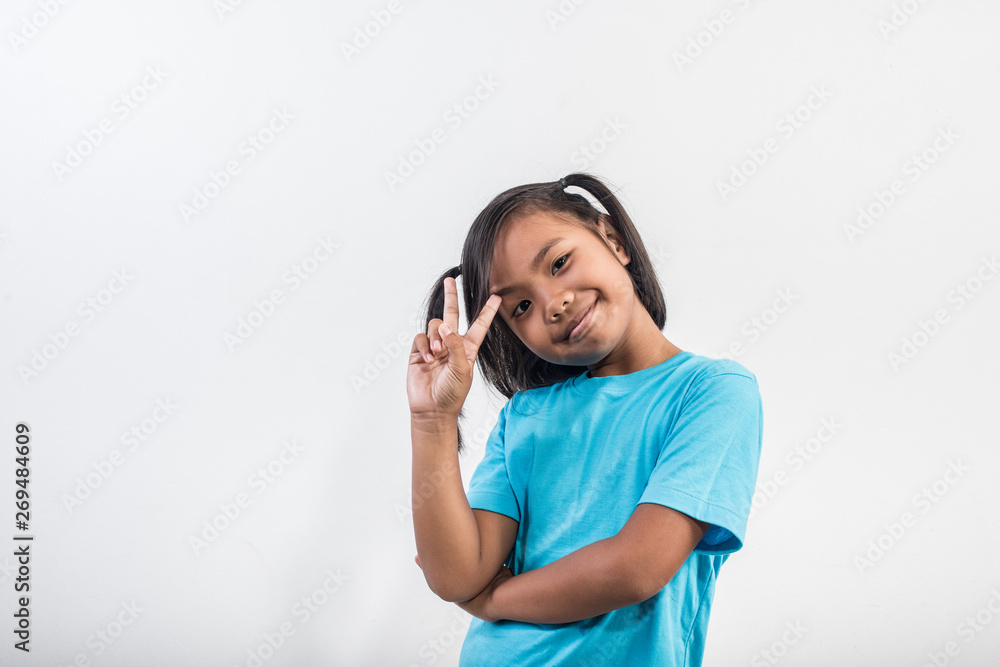 Portrait of Funny little girl acting in studio shot Portrait of Funny little girl acting in studio shot