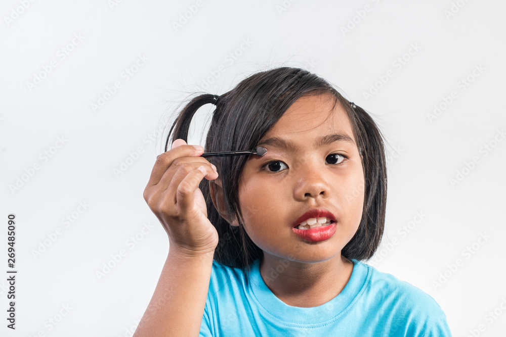 Portrait little girl makeup with her face Portrait little girl makeup with her face