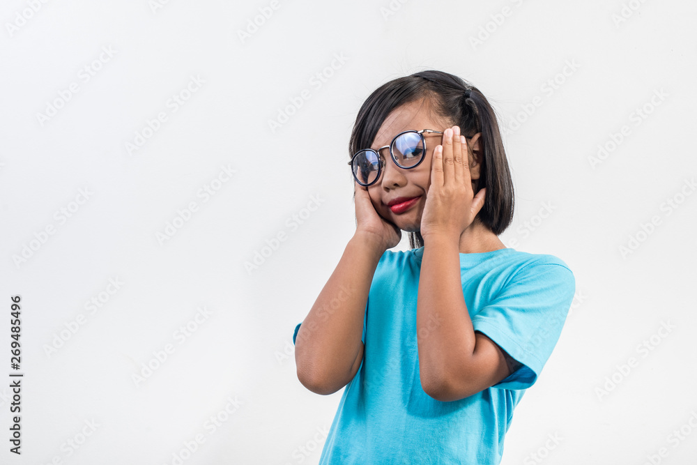 Portrait of Funny little girl acting in studio shot Portrait of Funny little girl acting in studio shot