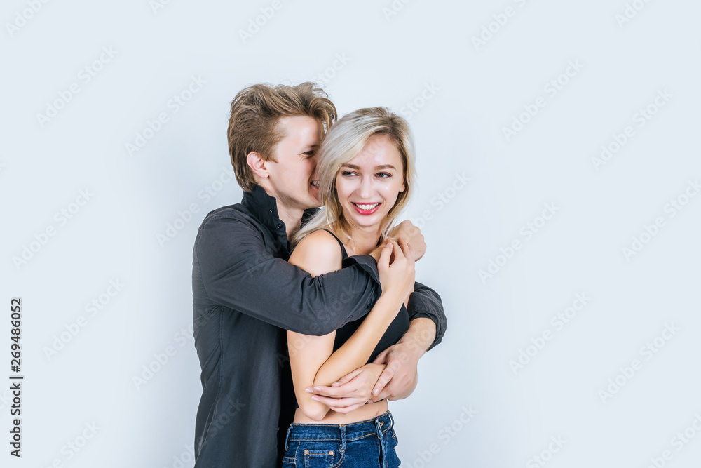 Portrait of happy young couple in studio Portrait of happy young couple in studio