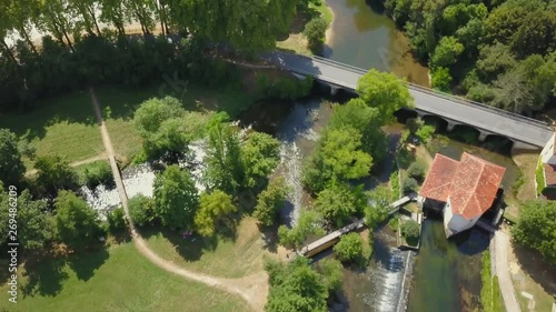 Aerial view over small french riverscape in rural Tocane, France photo