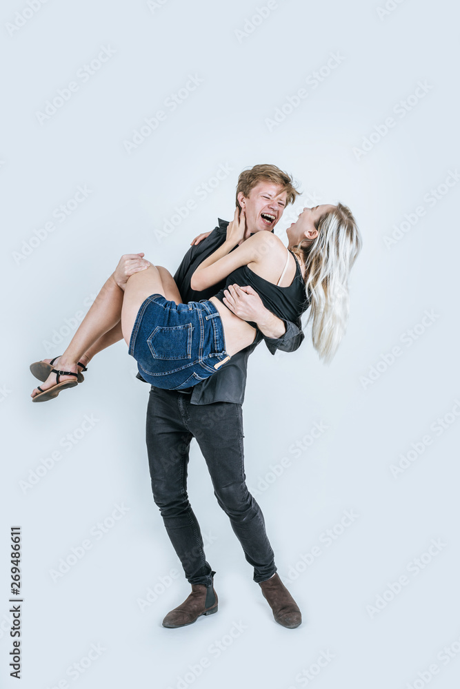 Portrait of happy young couple love together in studio Portrait of happy young couple love together in studio