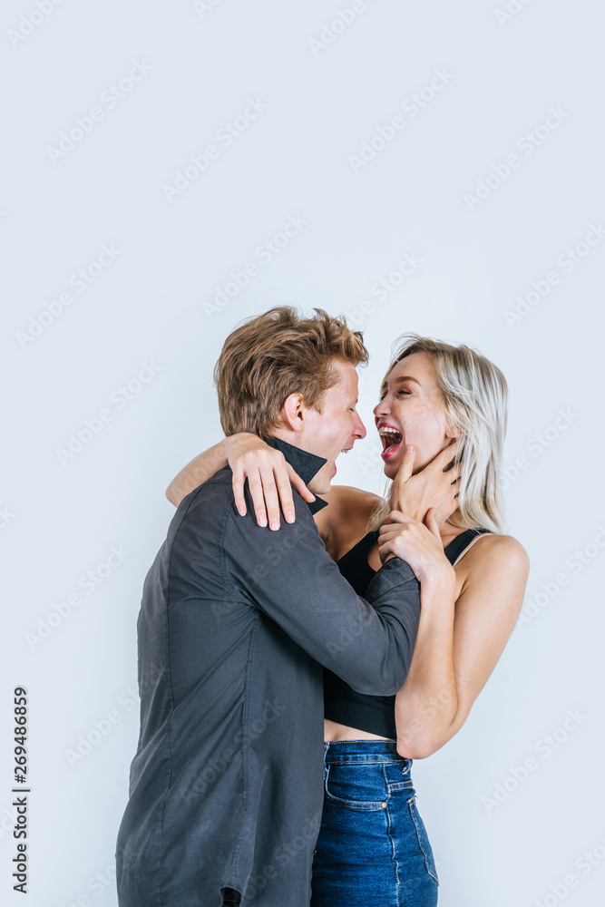 Portrait of happy young couple love together in studio Portrait of happy young couple love together in studio
