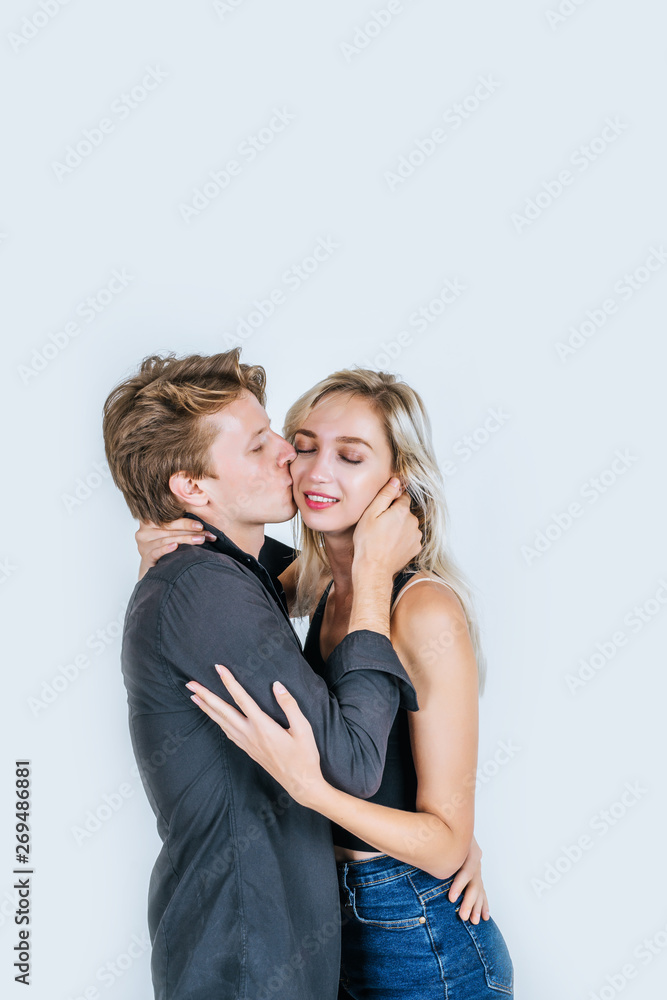 Portrait of happy young couple love together in studio Portrait of happy young couple love together in studio