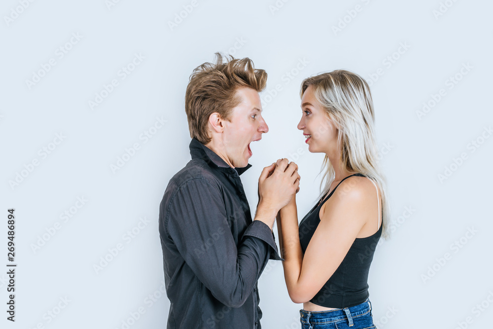Portrait of happy young couple love together in studio Portrait of happy young couple love together in studio