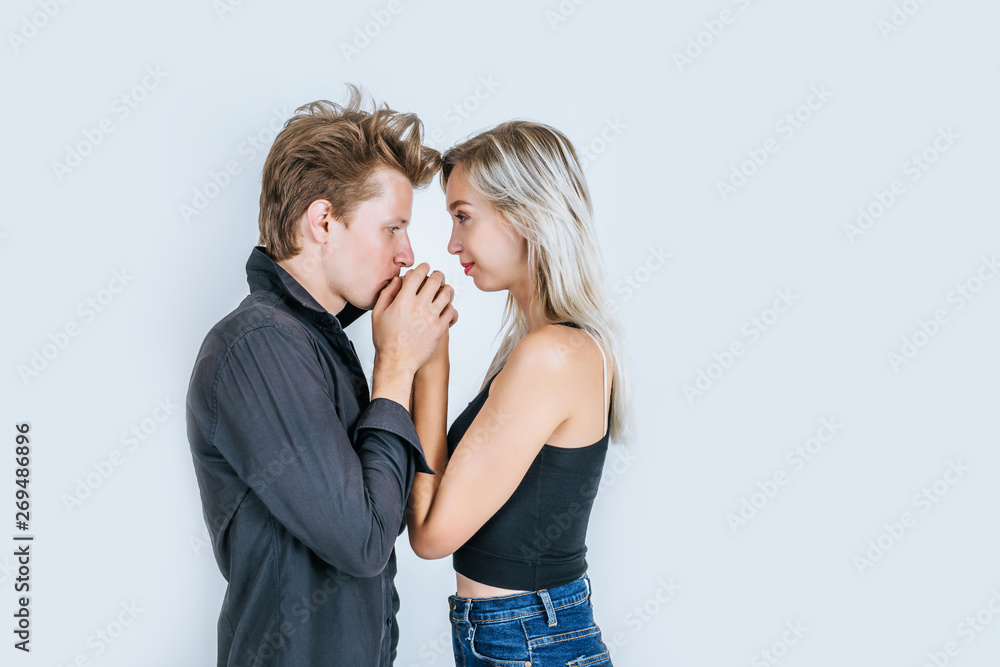 Portrait of happy young couple love together in studio Portrait of happy young couple love together in studio