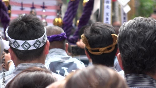ASAKUSA, TOKYO,  JAPAN - 18 MAY 2019 : Scenery of SANJA FESTIVAL.  It is one of the three great shinto festivals in Tokyo.  Slow motion shot. photo