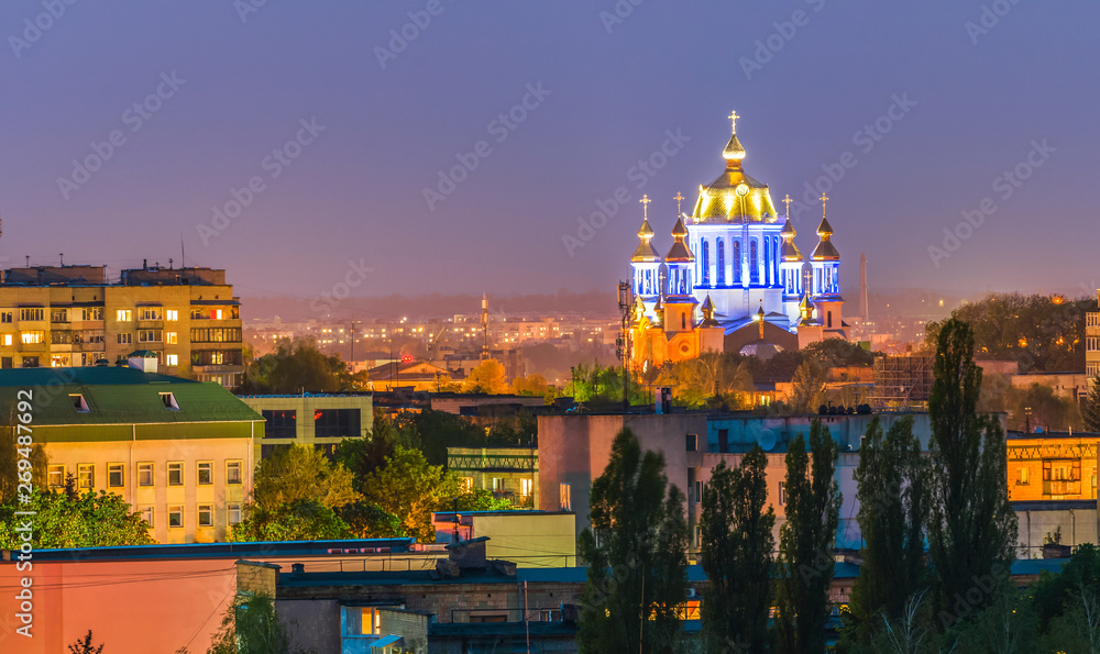 View of the evening city and the Intercession Cathedral of the city of Rivne, Ukraine.