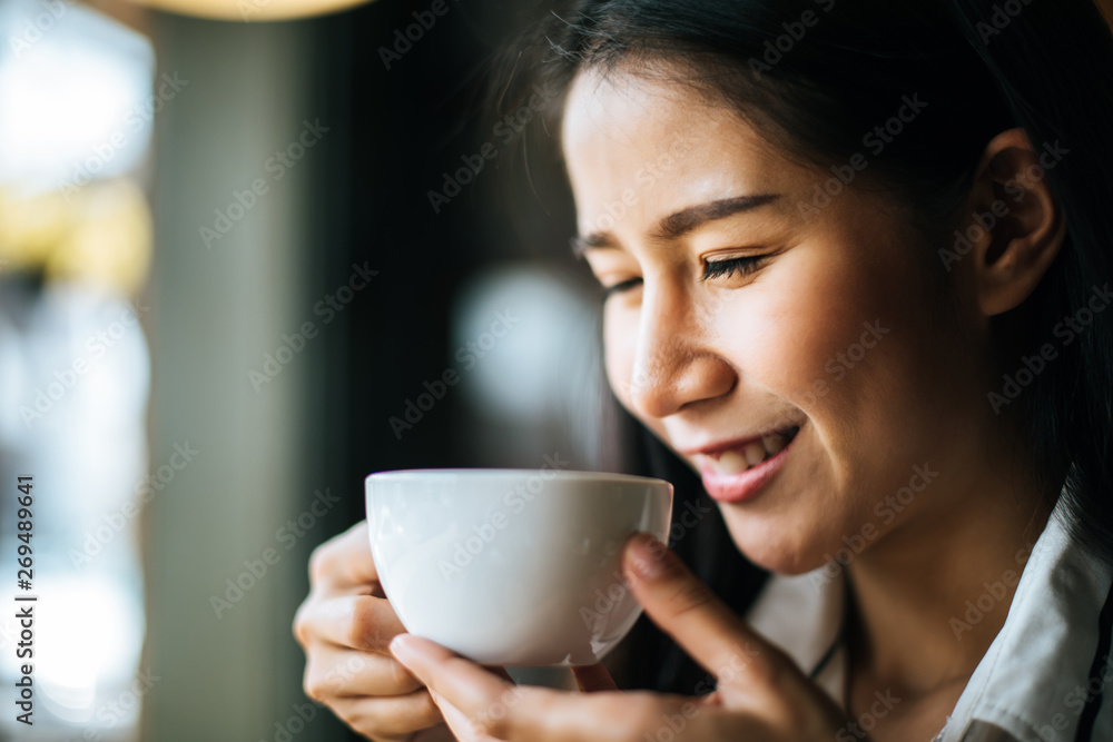 Portrait asian woman smiling relax in coffee shop cafe Portrait asian woman smiling relax in coffee shop cafe