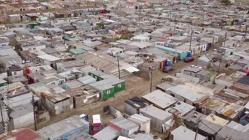 An aerial shot of an informal settlement with low income tin shack housing in Africa. photo