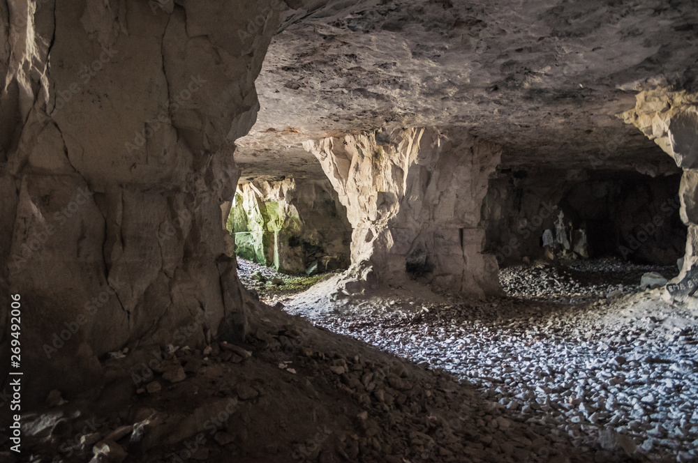 artificial cave under earth journey. wild cave, forgotten passages deep underground.