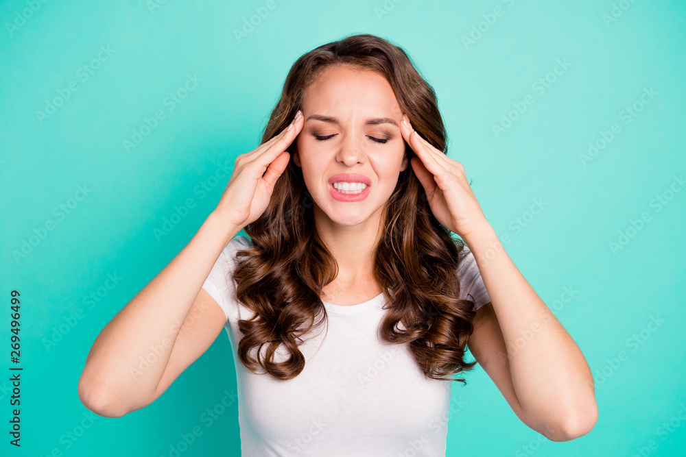 Close-up portrait of her she nice-looking attractive lovely worried tired overworked wavy-haired lady touching temples having pain attack isolated on bright vivid shine blue background