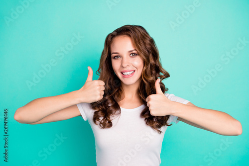 Close-up portrait of her she nice attractive lovely cheerful cheery wavy-haired lady showing thumbsup ad promo sale discount isolated on bright vivid shine blue background