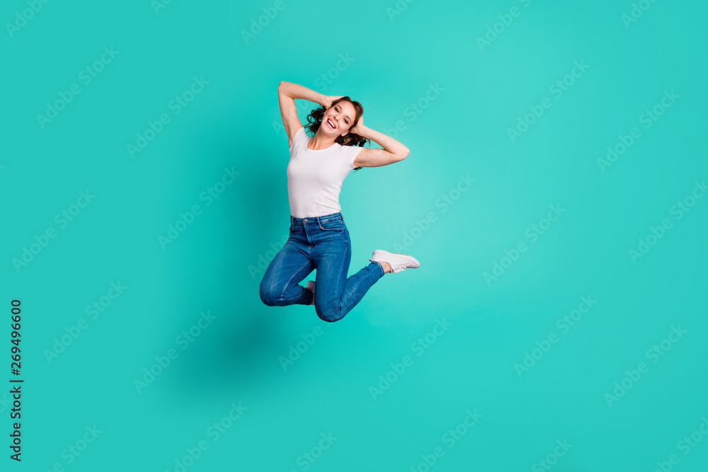 Full length body size view of her she nice-looking attractive lovely careless cheerful cheery wavy-haired lady having fun enjoying summer time isolated on bright vivid shine blue background