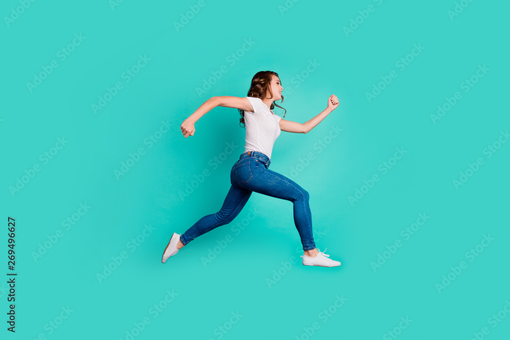 Full length body size profile side view of her she nice-looking attractive lovely cheerful purposeful wavy-haired lady going home isolated on bright vivid shine blue background