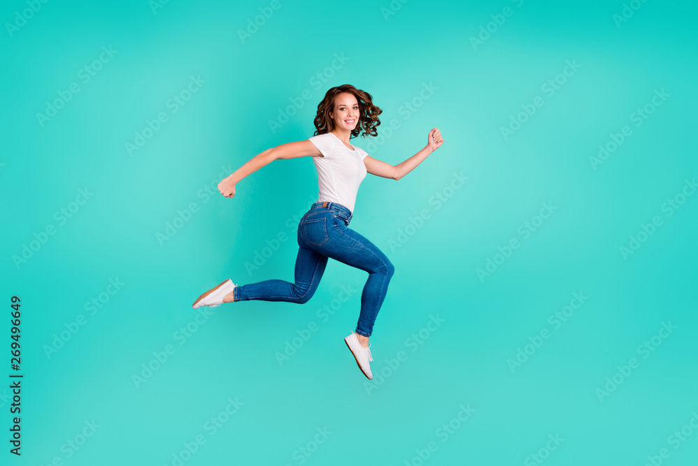 Full length body size profile side view of her she nice attractive lovely cheerful cheery strong wavy-haired lady going for a walk isolated on bright vivid shine blue background