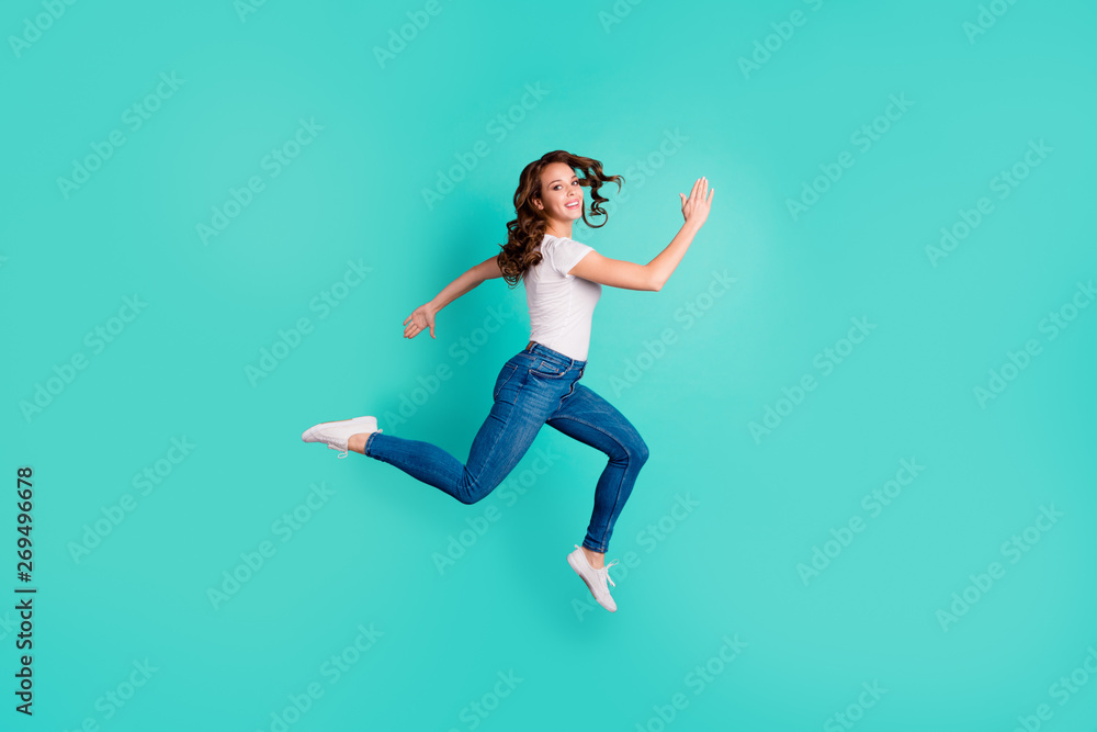 Full length body size profile side view of her she nice-looking attractive lovely cheerful cheery wavy-haired lady going to shop mall sale discount isolated on bright vivid shine blue background