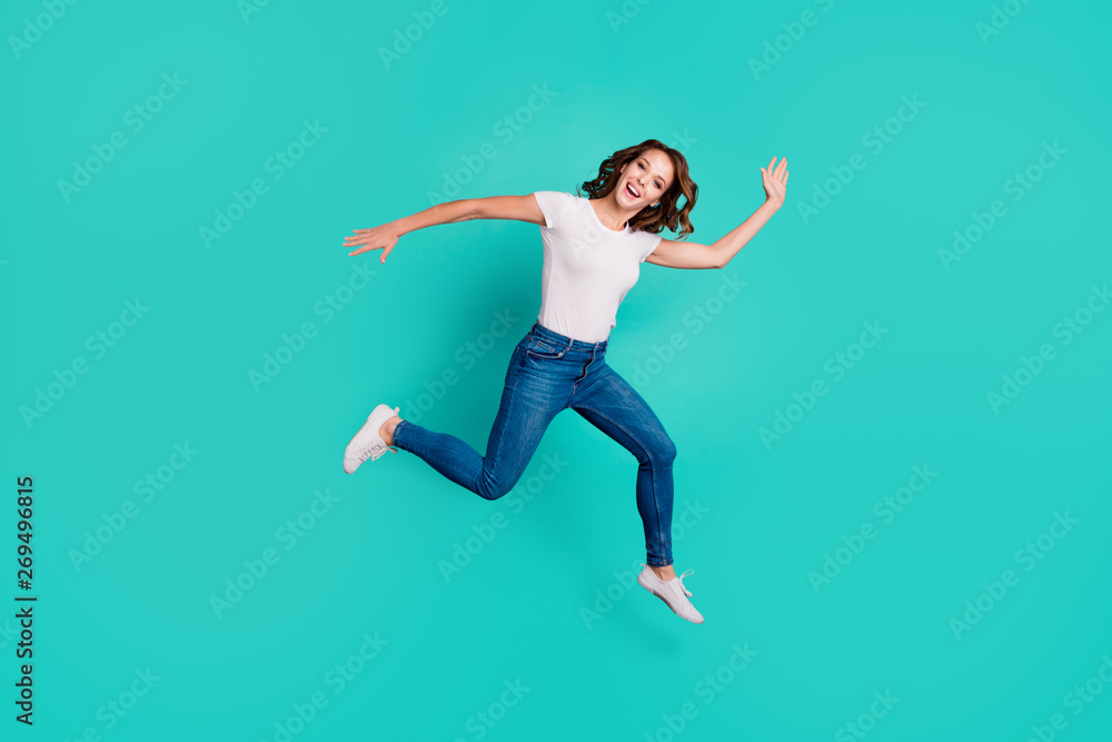Full length body size view of her she nice attractive lovely crazy careless carefree cheerful slim fit thin slender wavy-haired lady having fun holiday isolated on bright vivid shine blue background