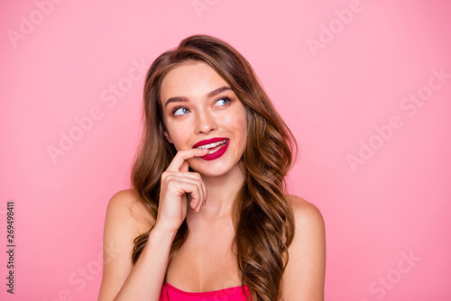 Close up photo amazing beautiful she her lady think over ponder pensive look sly side empty space hand arm white teeth wear cute shiny colorful dress isolated pink rose bright vivid background