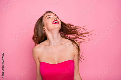 Close up photo beautiful she her dancing prom queen lady wind flight blow air glad warm weather plump allure rose lips graduation party wear cute shiny colorful dress isolated pink bright background
