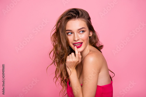 Close up side profile photo amazing beautiful she her wondered lady attractive appearance finger touch plump allure rose lips pomade lipstick wear cute colorful dress isolated pink bright background