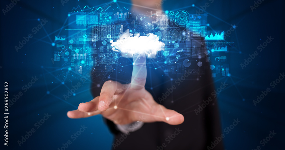 Man touching hologram projection displaying information from cloud based system
Man touching hologram projection displaying information from cloud based system