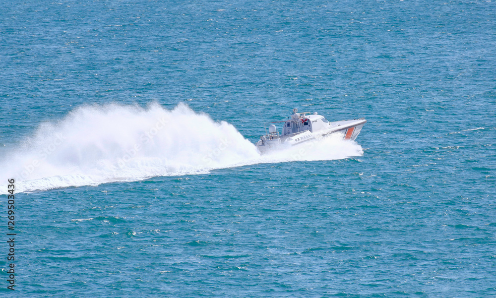 Fototapeta premium Coast Guard patrol boat rushing to the rescue M