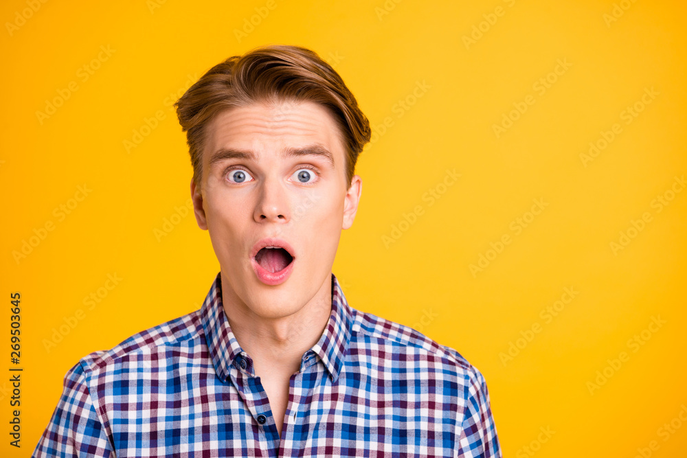 Close up photo amazing he him his man ideal perfect hairstyle styling mouth open eyes full fear oh no facial expression wear casual plaid checkered shirt outfit isolated yellow bright background Close up photo amazing he him his man ideal perfect hairstyle styling mouth open eyes full fear oh no facial expression wear casual plaid checkered shirt outfit isolated yellow bright background