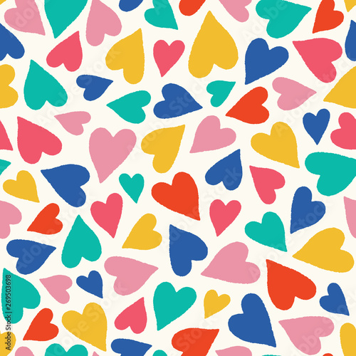 Hand drawn colorful tossed heart pattern. A pretty vector seamless repeat pattern ideal for valentines fabric, scrap booking and stationery projects projects.