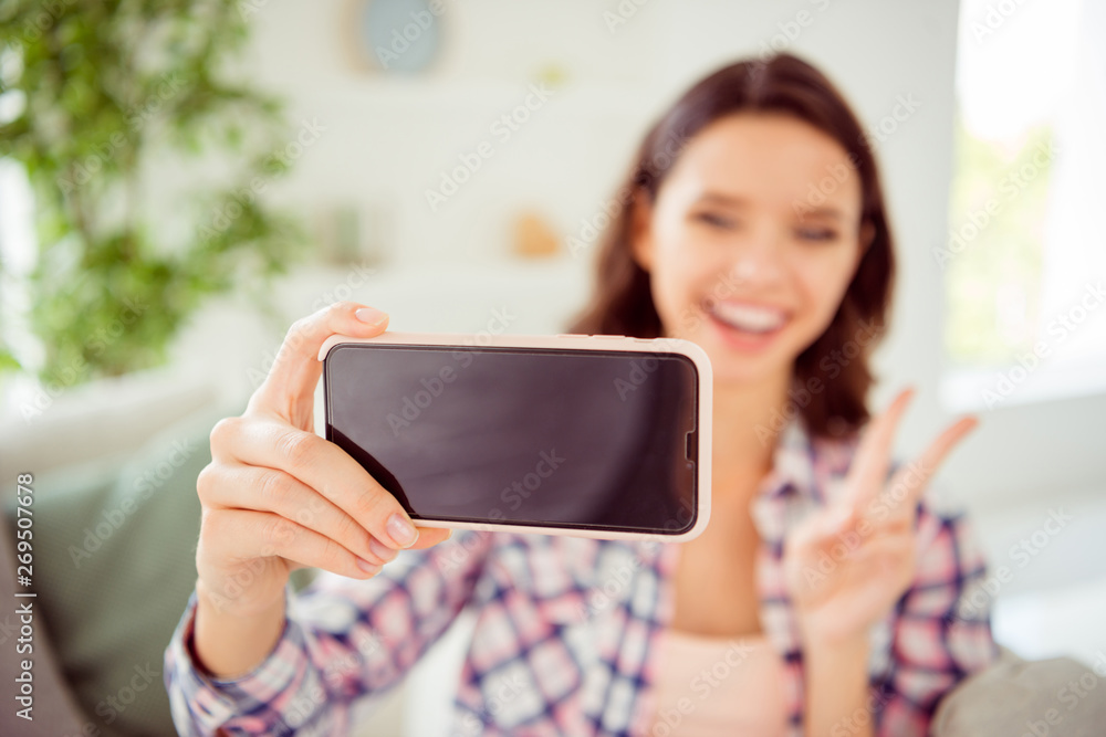 Close up photo of cheerful positive stylish trendy youth hold hand modern technology make photos video call fun funny funky laugh laughter wavy curly hairstyle plaid shirt outfit room Close up photo of cheerful positive stylish trendy youth hold hand modern technology make photos video call fun funny funky laugh laughter wavy curly hairstyle plaid shirt outfit room