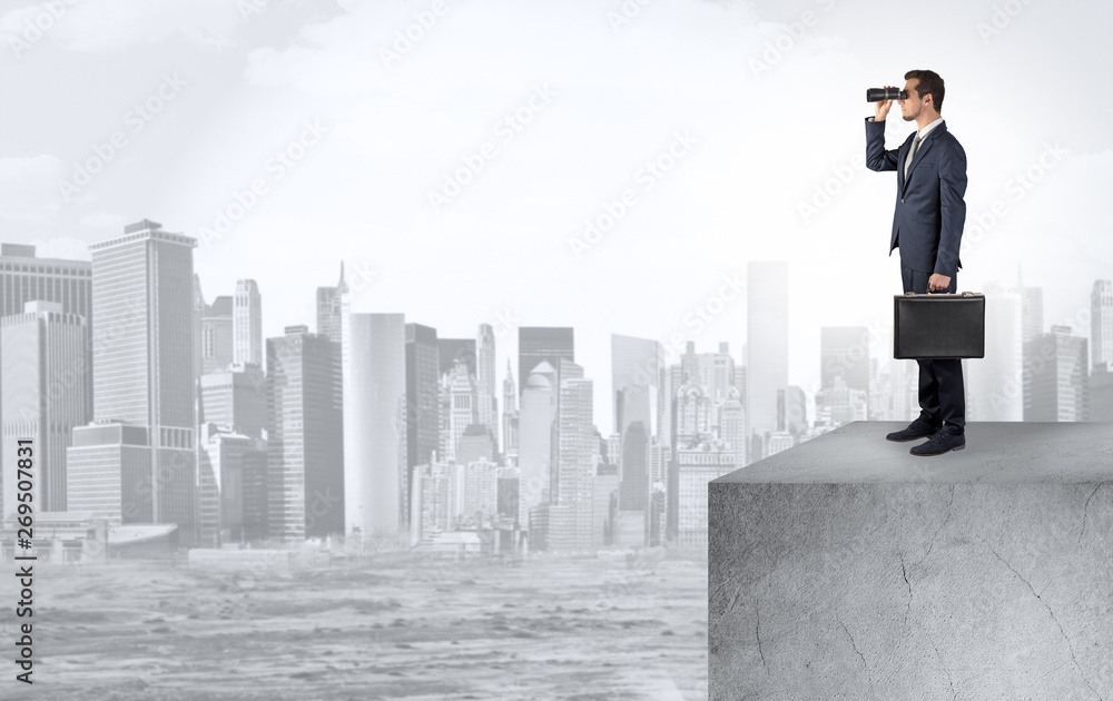 Young investor looking to the city from distance and thinking about investment
Young investor looking to the city from distance and thinking about investment