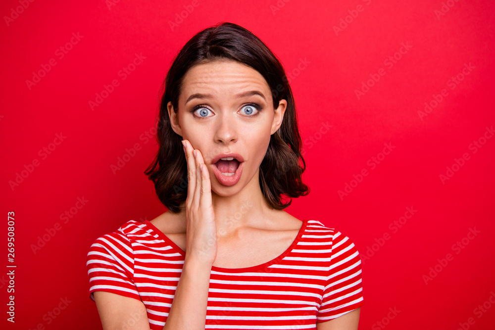 Fototapeta premium Portrait of astonished impressed lady scream shout horrified terrible news novelty touch cheeks hand palm yell gossip rumor secret privacy wear modern youth clothes isolated bright background