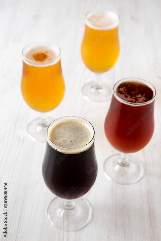 Сold craft beer assortment, side view. Close-up. Сold craft beer assortment, side view. Close-up.