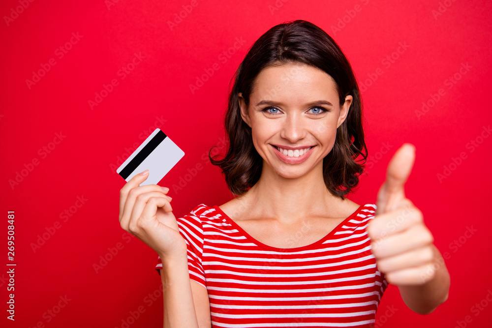 Portrait of excited funny cute lady feel confident give excellent advert advice choice decision demonstrate recommend positive cheerful wear striped stylish trendy t-shirt isolated red background Portrait of excited funny cute lady feel confident give excellent advert advice choice decision demonstrate recommend positive cheerful wear striped stylish trendy t-shirt isolated red background