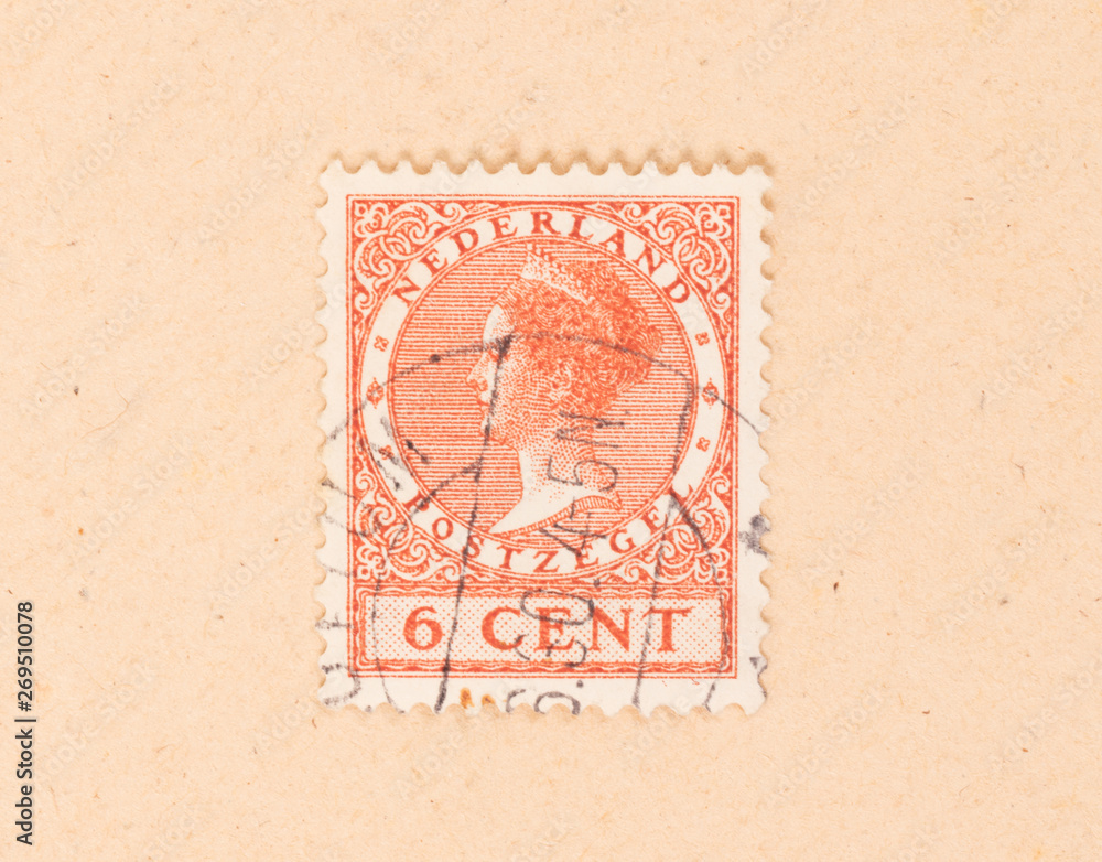 THE NETHERLANDS 1950: A stamp printed in the Netherlands shows the queen, circa 1950