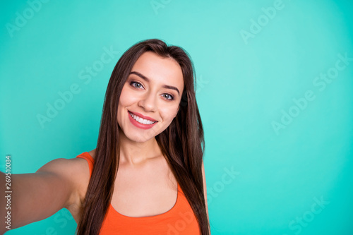 Close up photo beautiful amazing her she lady coquette make take selfies tell speak say skype perfect ideal white teeth wear casual orange tank-top isolated bright blue teal turquoise background