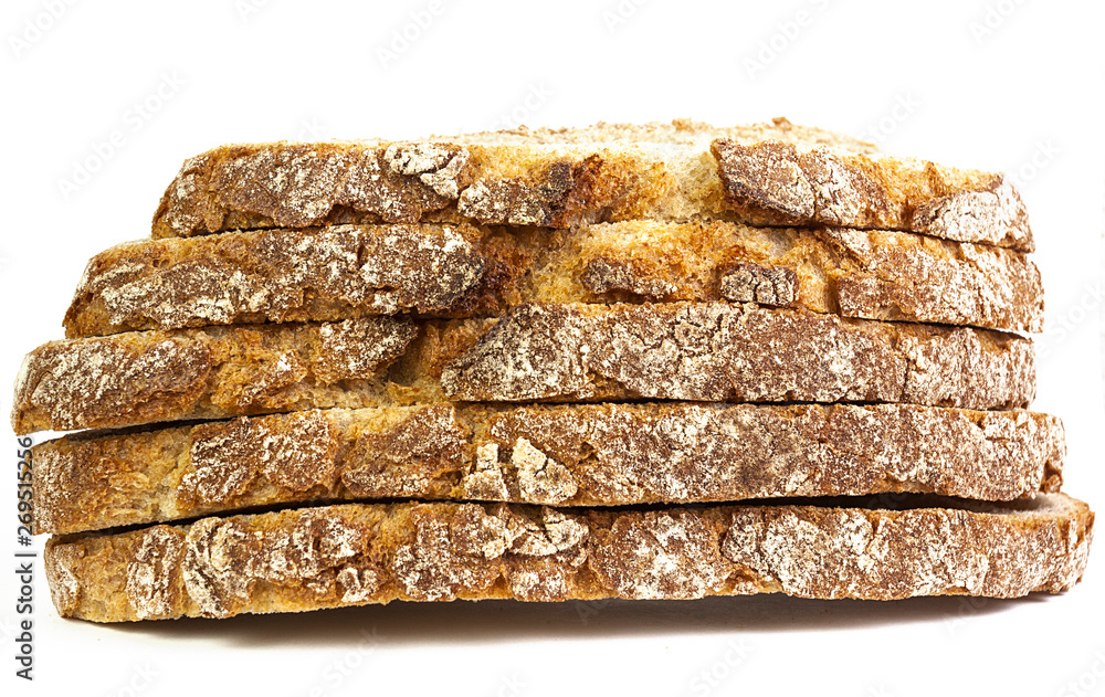 RUSTIC BREAD CUT IN SLICES ON A WHITE BACKGROUND