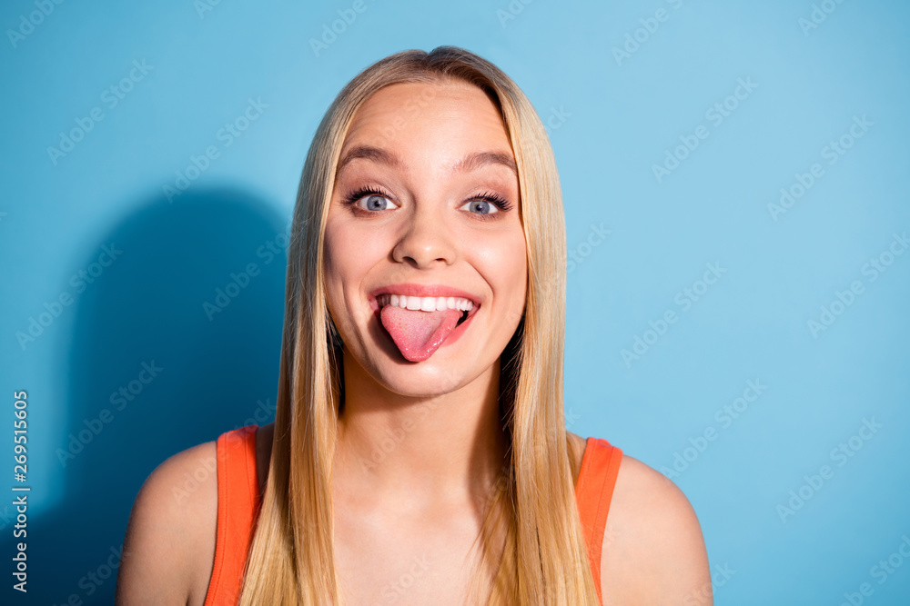 Close-up portrait of her she nice-looking shine sweet attractive lovely winsome cheerful cheery funky straight-haired teen girl grimacing having fun isolated over blue green turquoise background Close-up portrait of her she nice-looking shine sweet attractive lovely winsome cheerful cheery funky straight-haired teen girl grimacing having fun isolated over blue green turquoise background
