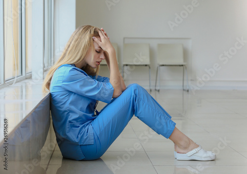 Depressed female medical as...