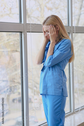 Depressed female medical as...