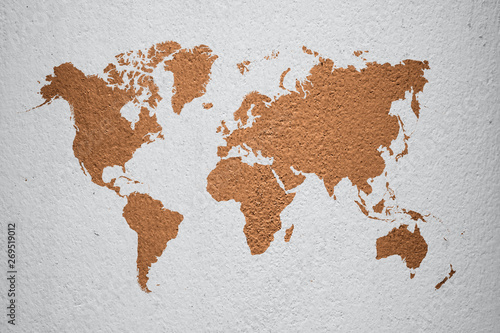 Fototapeta Naklejka Na Ścianę i Meble -  world map on brown cement wall background