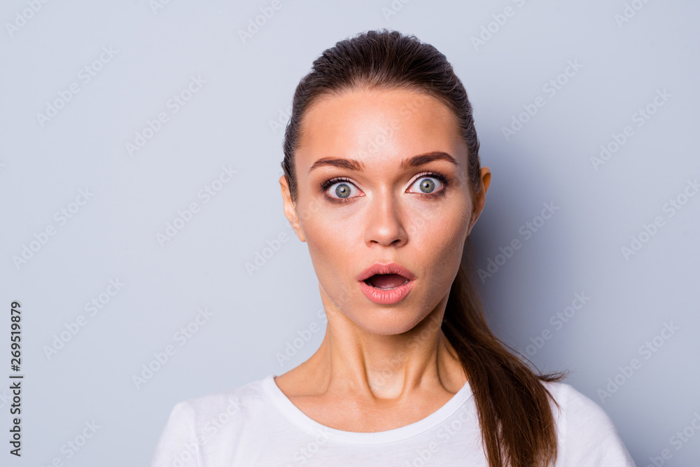 Close up photo beautiful amazing pretty she her lady big great eyes full fear staring stupor open mouth unexpected news epic fail lost loser wear casual white t-shirt isolated grey background Close up photo beautiful amazing pretty she her lady big great eyes full fear staring stupor open mouth unexpected news epic fail lost loser wear casual white t-shirt isolated grey background