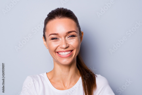 Close up photo beautiful amazing pretty she her lady show ideal white teeth laughing out loud hear humorous story funny funky carefree mood wear casual white t-shirt isolated grey background