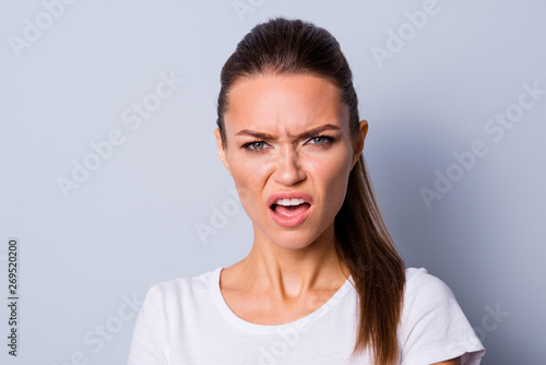 Close up photo amazing beautiful she her lady not fear situation epic fail bad mood grimacing deny fault guilty sorry stress wear casual white t-shirt clothes isolated grey background