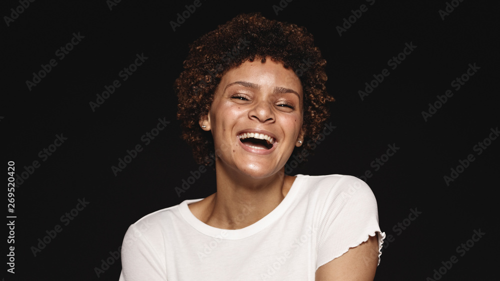 Happy young woman with curly hair Happy young woman with curly hair