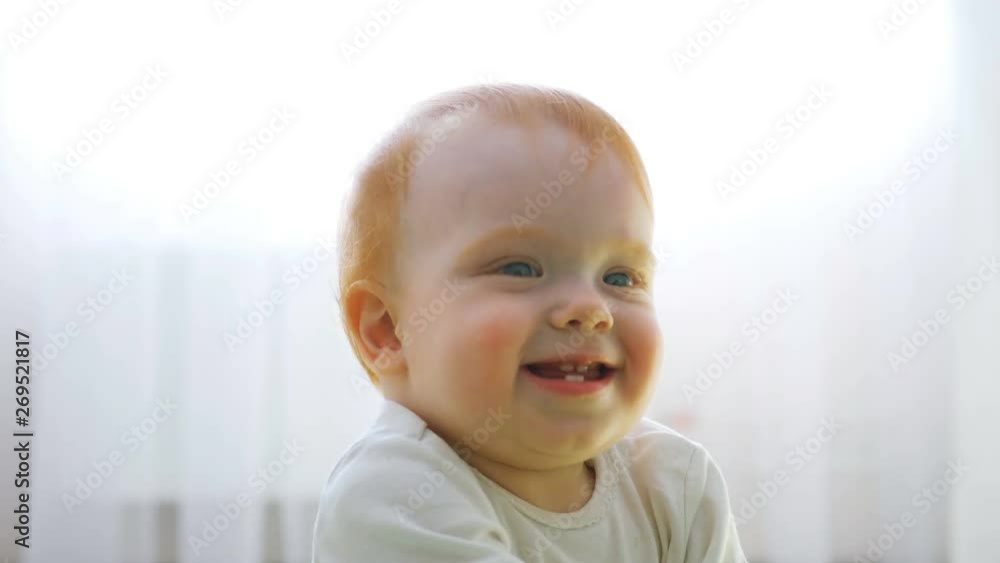 closeup portrait cute caucasian redhead girl having fun at home looking at camera closeup portrait cute caucasian redhead girl having fun at home looking at camera